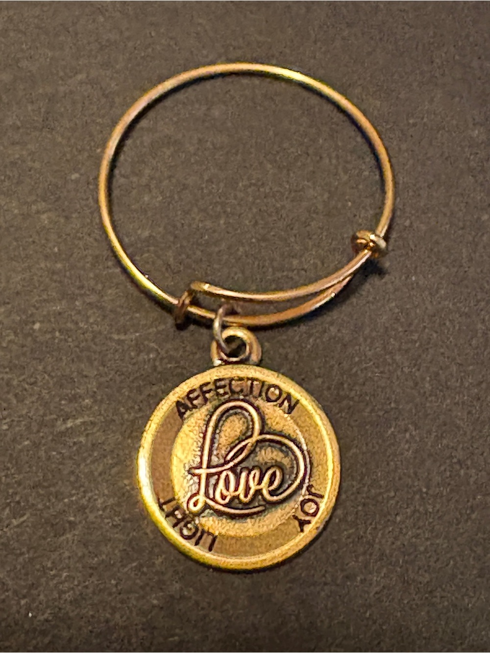 NWOT Alex and Ani adjustable ring with a round 'Love' charm